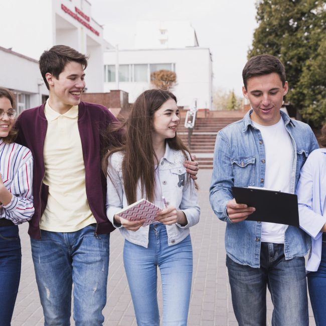 young-college-students-walking-together